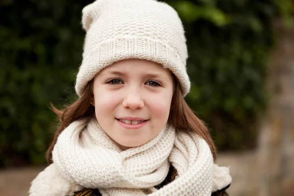 Girl in warm coat outdoors — Stock Photo, Image