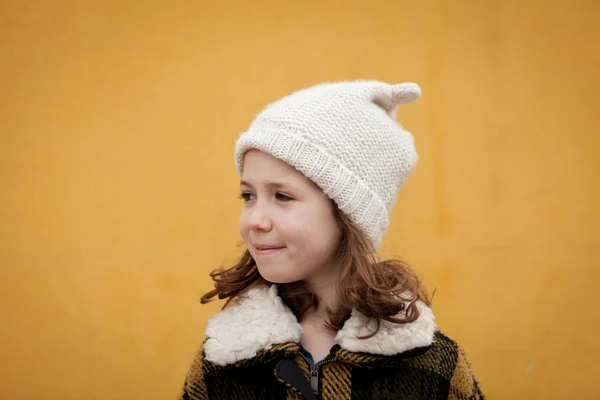 Girl in warm coat outdoors — Stock Photo, Image