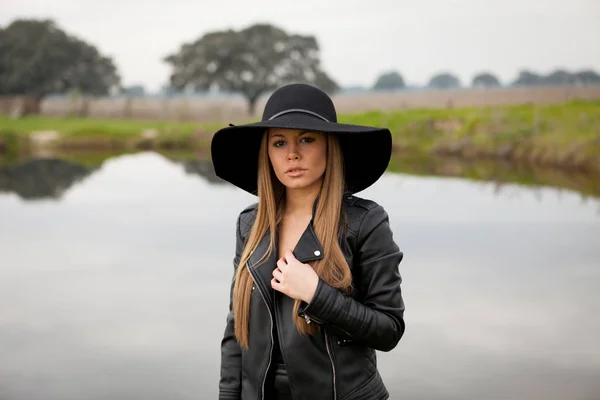 Stylish woman with beautiful hat — Stock Photo, Image