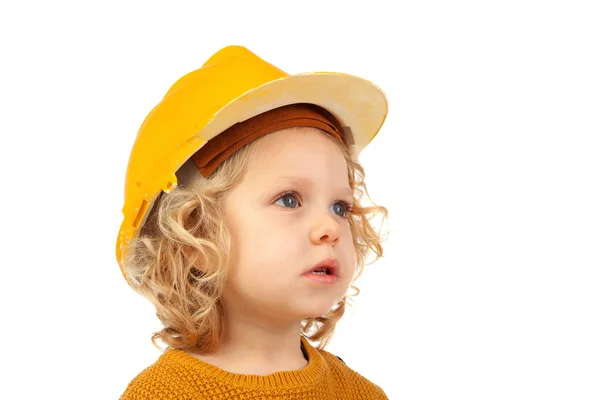 Mignon petit enfant avec casque jaune — Photo