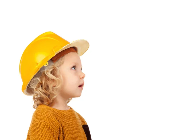 Criança bonito com capacete amarelo — Fotografia de Stock