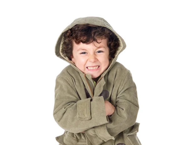 Niño muy frío con abrigo encapuchado —  Fotos de Stock