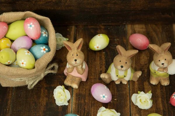 Easter bunnies and colorful eggs — Stock Photo, Image