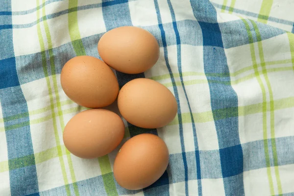 Raw eggs on napkin — Stock Photo, Image
