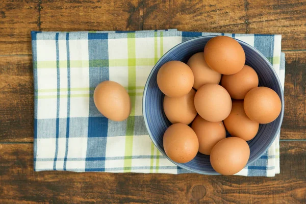 Raw eggs in bowl — Stock Photo, Image