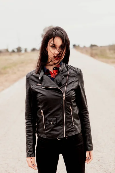 woman with black leather jacket