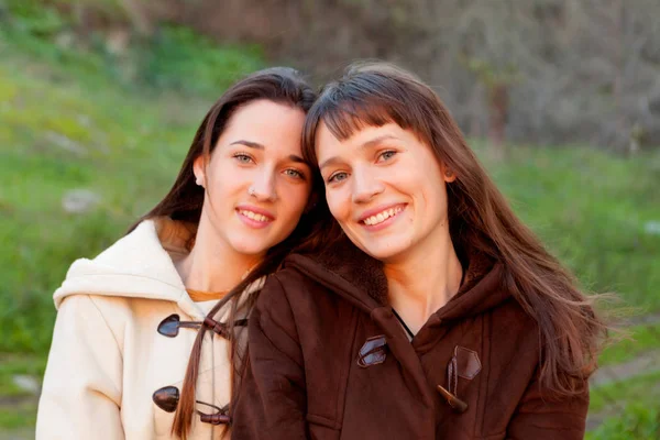 Young sisters in park Stock Image