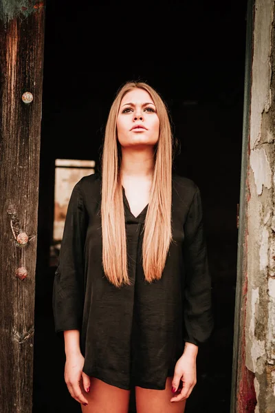 Beautiful blonde girl with black shirt — Stock Photo, Image
