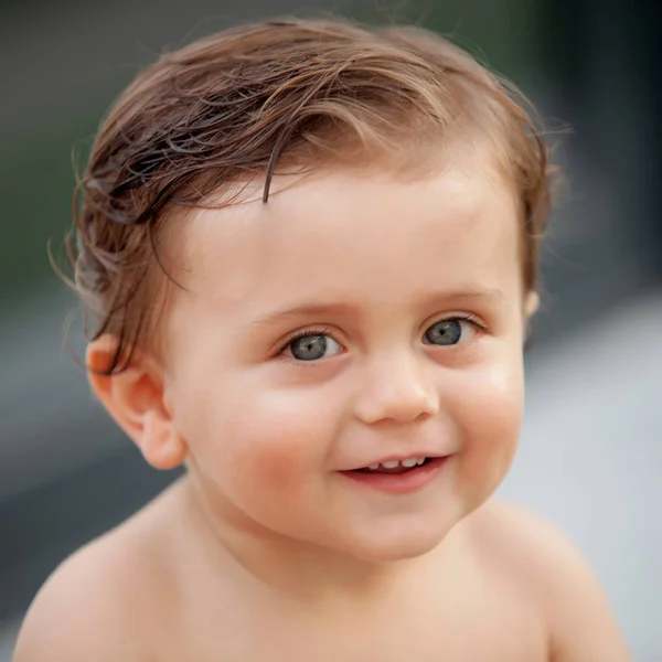 Beautiful baby with wet hair — Stock Photo, Image