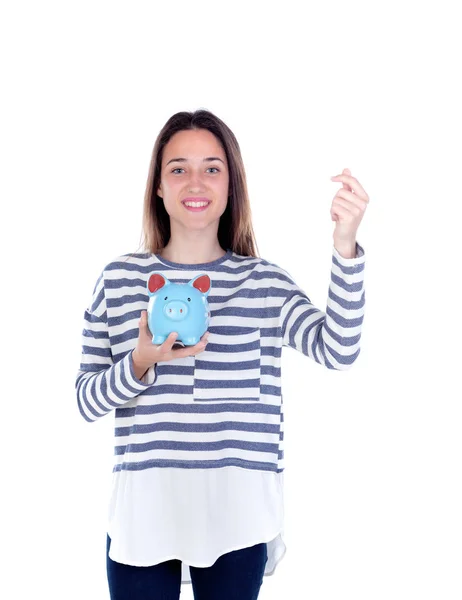 Menina adolescente com banco porquinho azul — Fotografia de Stock