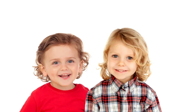 Glückliche lockige Kinder, die in die Kamera schauen — Stockfoto