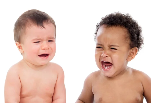 Duas criancinhas chorando — Fotografia de Stock