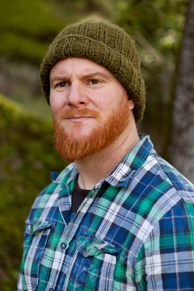 Red bearded man in plaid shirt — Stock Photo, Image