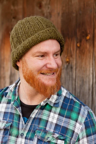 Red bearded man in plaid shirt — Stock Photo, Image