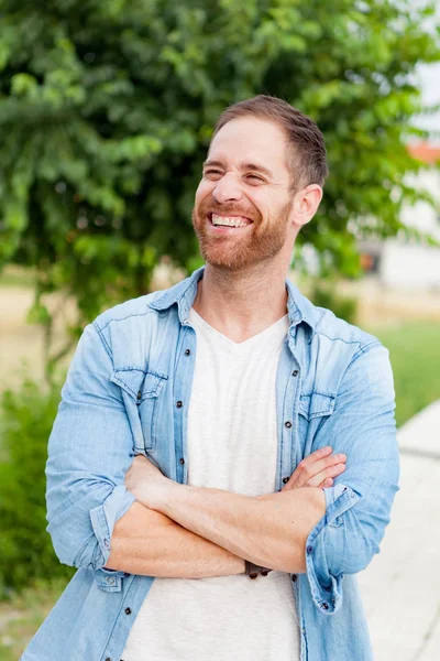 Casual guy relaxed in park