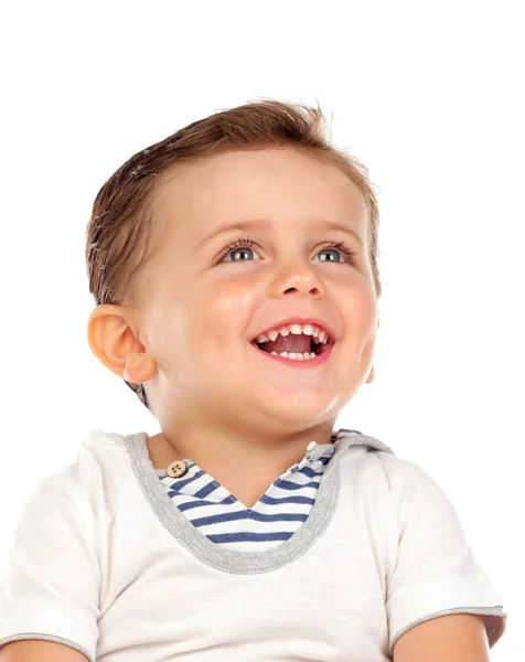 Дитина з красивою посмішкою дивиться вгору — стокове фото