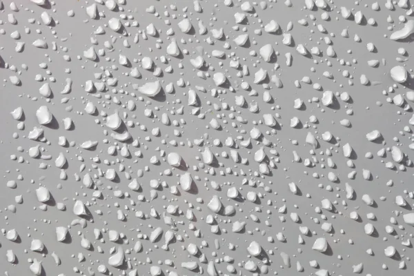 Drops on white surface — Stock Photo, Image