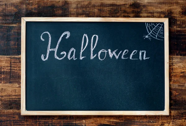 Blackboard with word Halloween — Stock Photo, Image