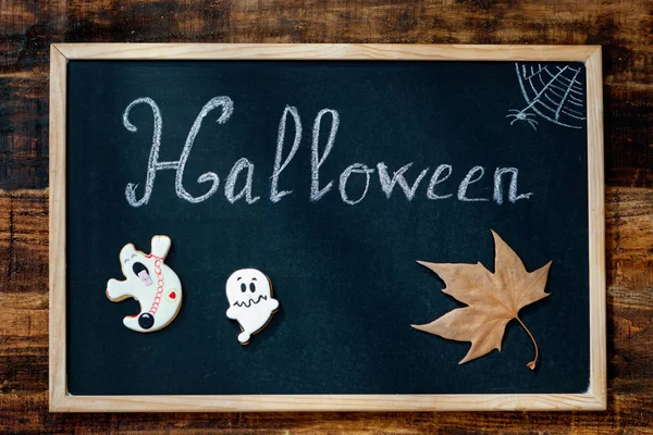 Blackboard with word Halloween — Stock Photo, Image