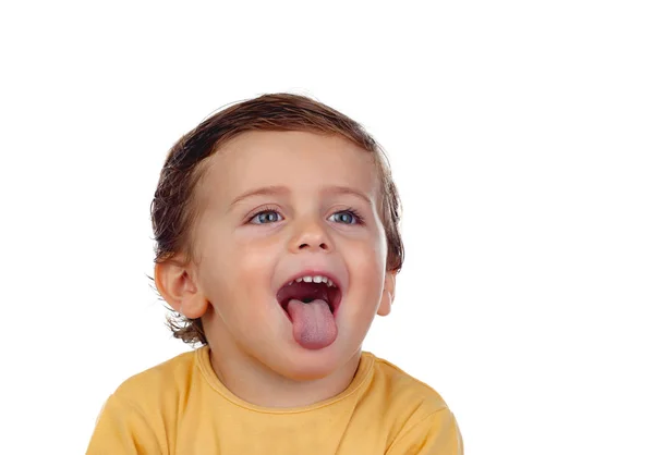 Adorabile bambino mostrando lingua — Foto Stock