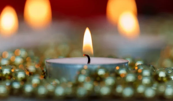 Burning Christmas candle — Stock Photo, Image