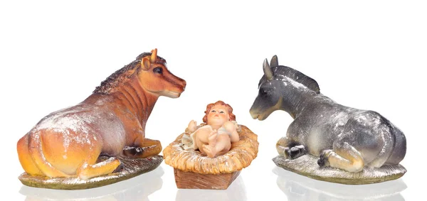 Bébé Jésus dans la crèche avec bœuf et mule — Photo