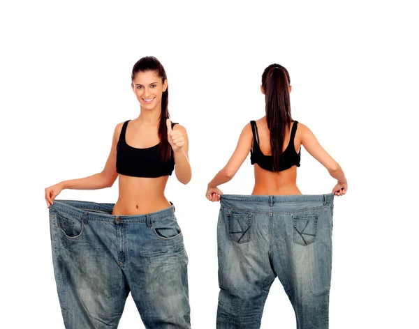 Mulher magro com calças enormes — Fotografia de Stock