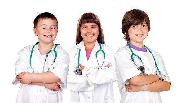 Három Aranyos Gyerekek Viselése Orvos Egységes Sztetoszkópok Pózol Fehér Háttér — Stock Fotó