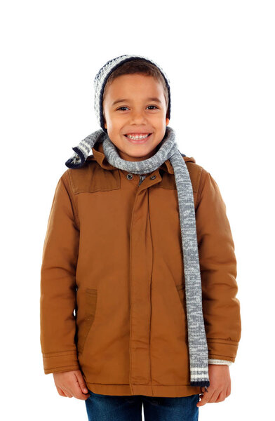 cute happy little African boy in warm cap, coat and wool scarf isolated on white background