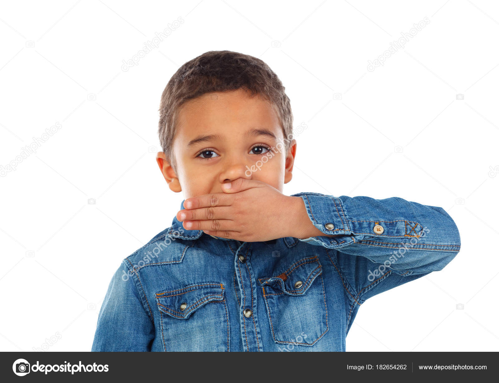 Funny little african boy Funny Little African Boy Denim Shirt Covering Mouth Isolated White
