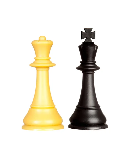 黑色国王和黄色皇后棋子被隔离在白色背景上 — 图库照片
