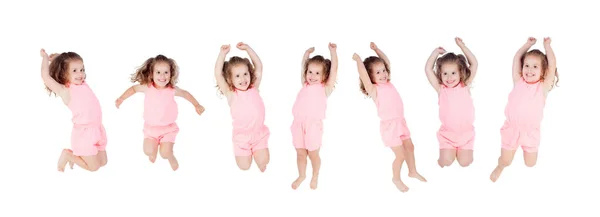 Schattige Lachende Meisje Roze Kleding Springen Geïsoleerd Een Witte Achtergrond — Stockfoto