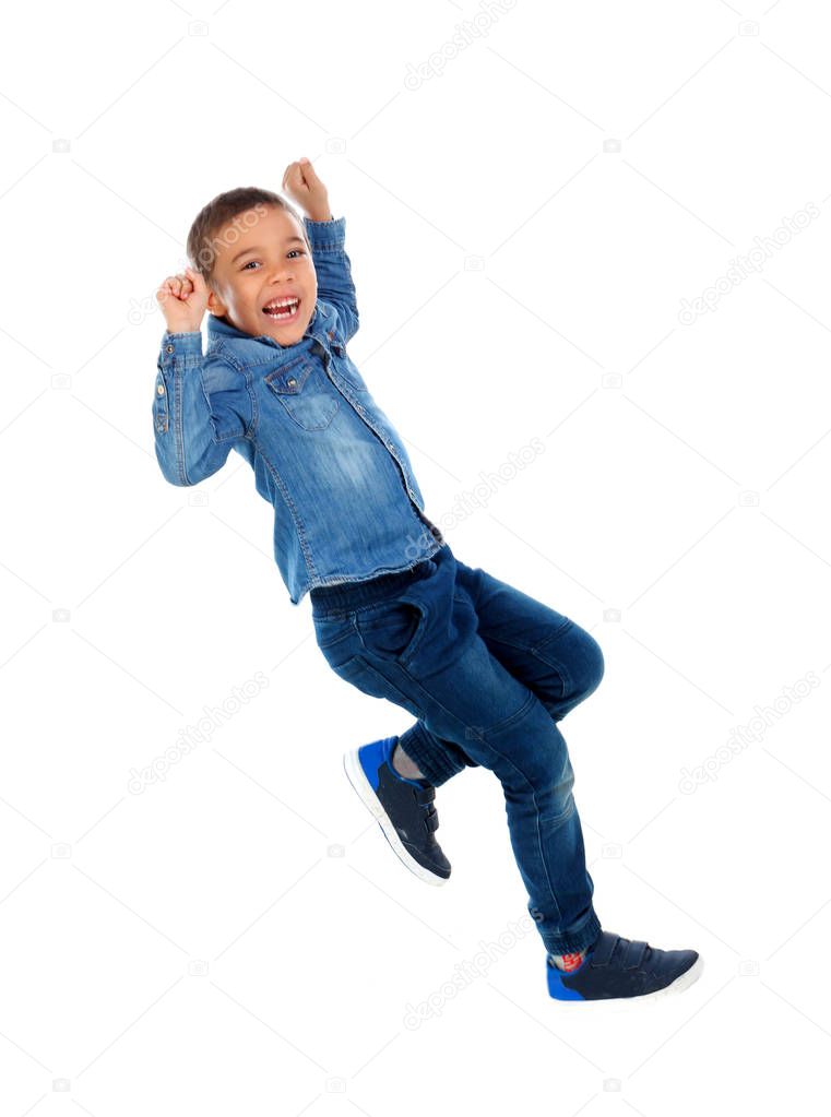 cute happy little African boy in denim shirt dancing  isolated on white background