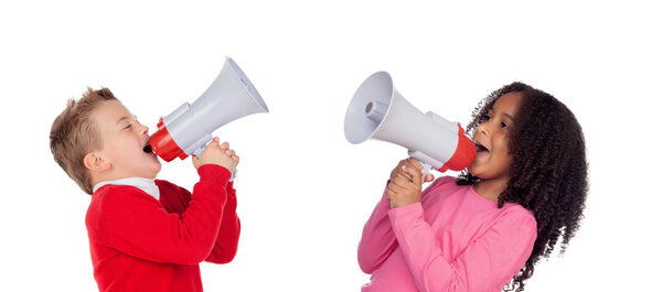 funny little boy and girl shouting through megaphones isolated on white background