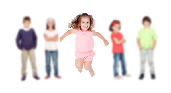 Cute Little Girl Jumping Blurred Kids Background — Stock Photo, Image