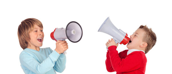 two cute little boys shouting through megaphones isolated on white background