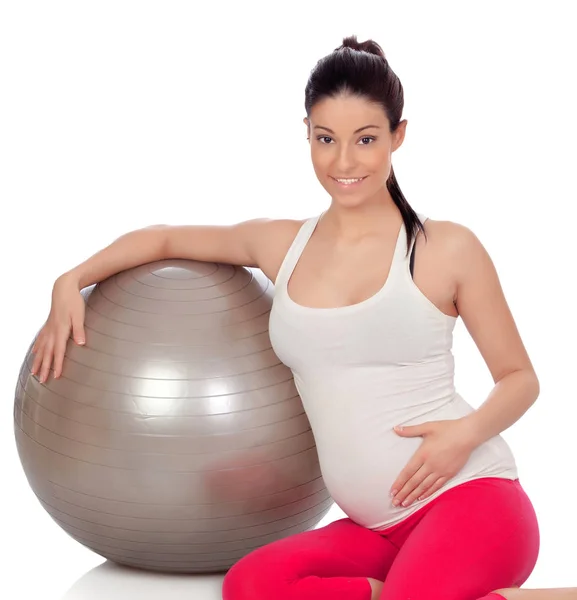 Hermosa mujer embarazada haciendo pilates — Foto de Stock