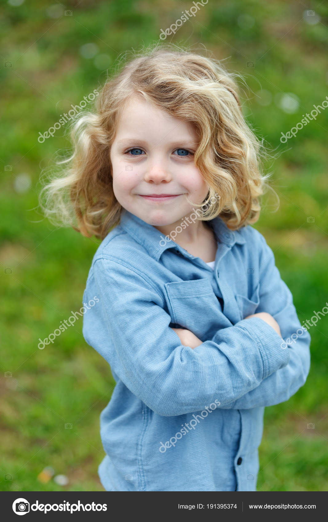 Happy Little Boy Long Blond Hair Posing Arms Crossed Outdoor