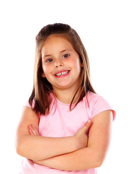 happy little girl in pink t-shirt posing with arms crossed isolated on white background
