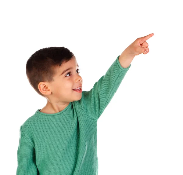 微笑的小男孩指向与他的手指隔绝在白色背景上 — 图库照片