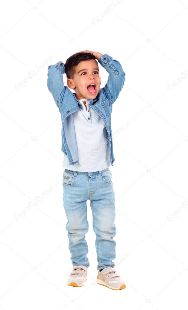 Surprised boy in denim clothes posing isolated on white background