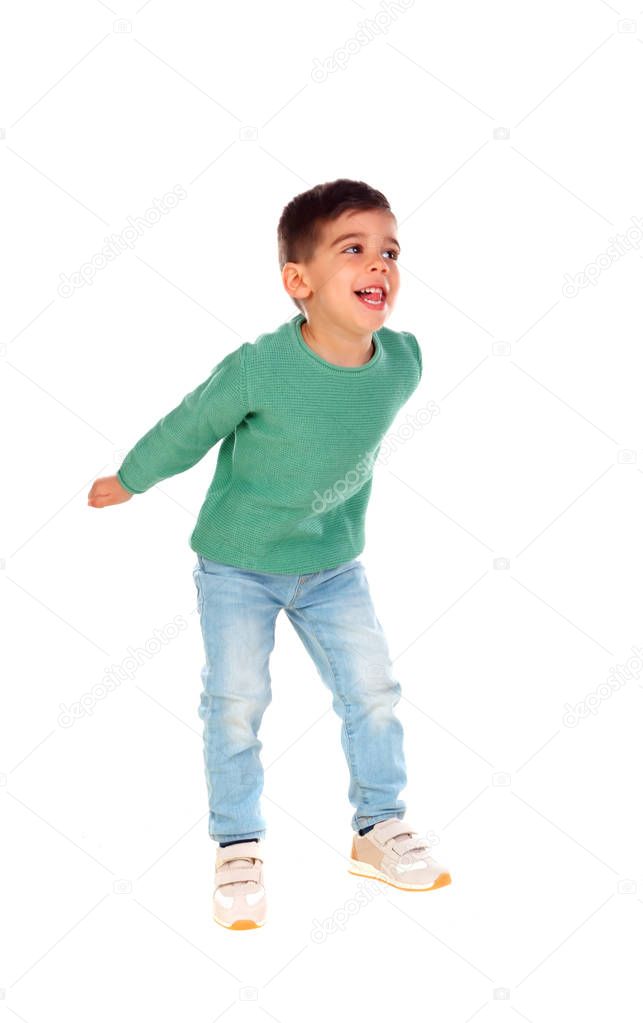smiling little boy dancing isolated on white background