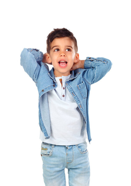 Surprised boy in denim clothes posing isolated on white background