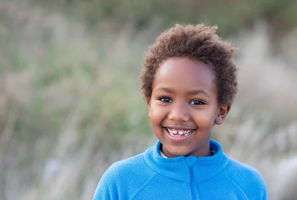 Happy african child with blue jersey — Stock Photo, Image