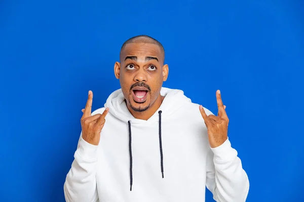 African Guy Wearing White Sweatshirt Blue Background — Stock Photo, Image