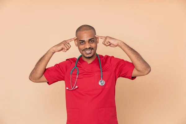 Pensive African Doctor Orange Background — Stock Photo, Image