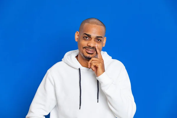 African Guy Wearing White Sweatshirt Blue Background — Stock Photo, Image