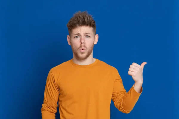 Attractive Young Guy Yellow Shirt Blue Background — Stock Photo, Image