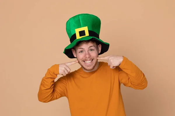 Attractive Young Guy Big Green Hat Yellow Background — Stock Photo, Image