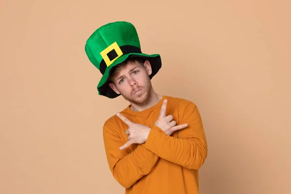 Attractive Young Guy Big Green Hat Yellow Background — Stock Photo, Image